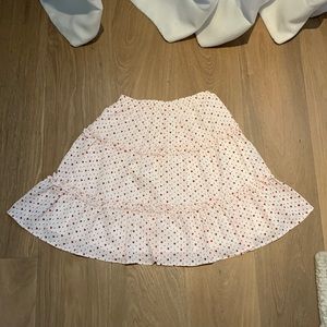Red heart patterned white skirt